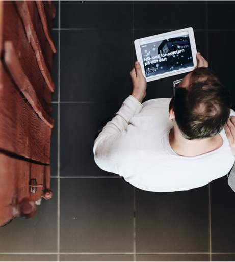 People looking at a tablet